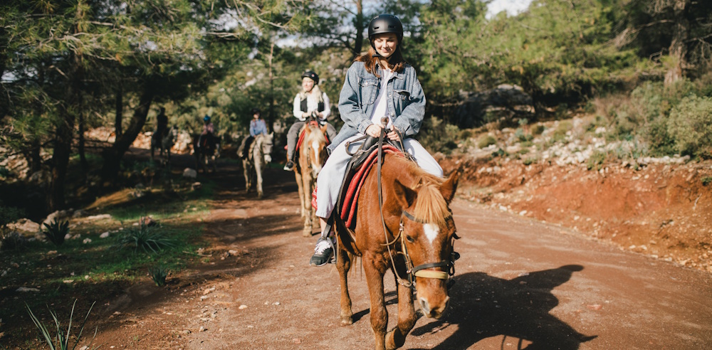 corporate team riding horses